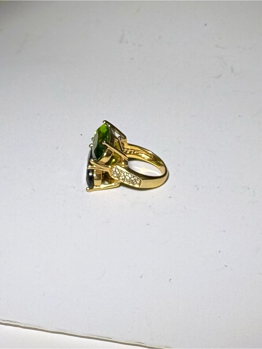 Gold Ring with Green Gemstone and Accent Stones